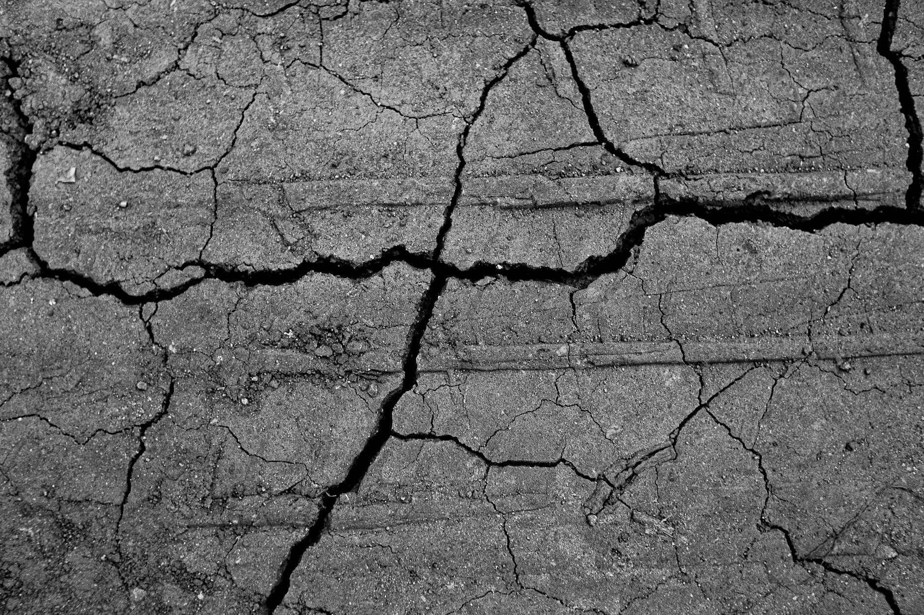 Close-up of a pothole in British tarmac targeted by AI pothole detection technology