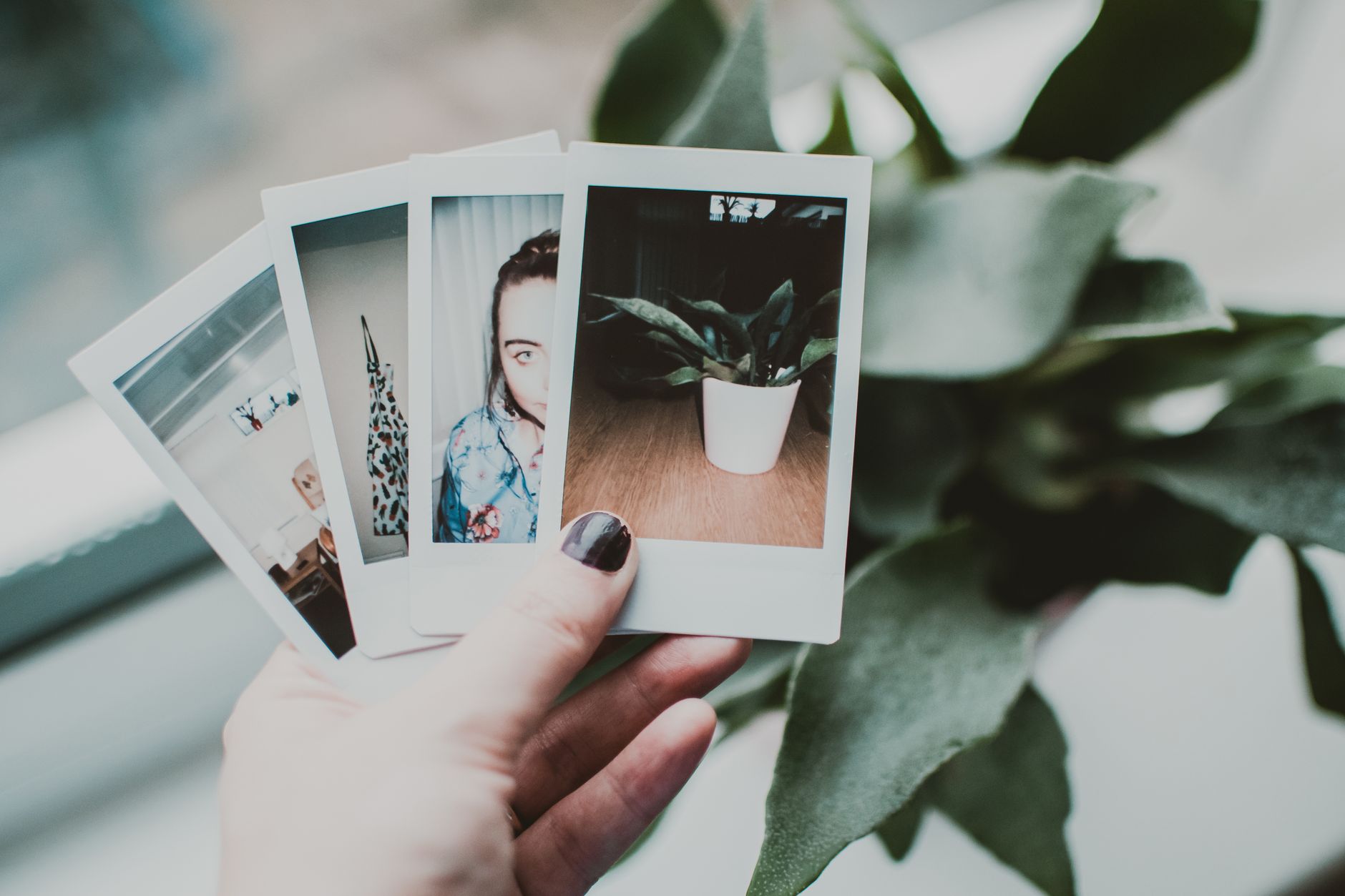 Polaroid instant camera with printed photos illustrating the retro tech trend UK 2026