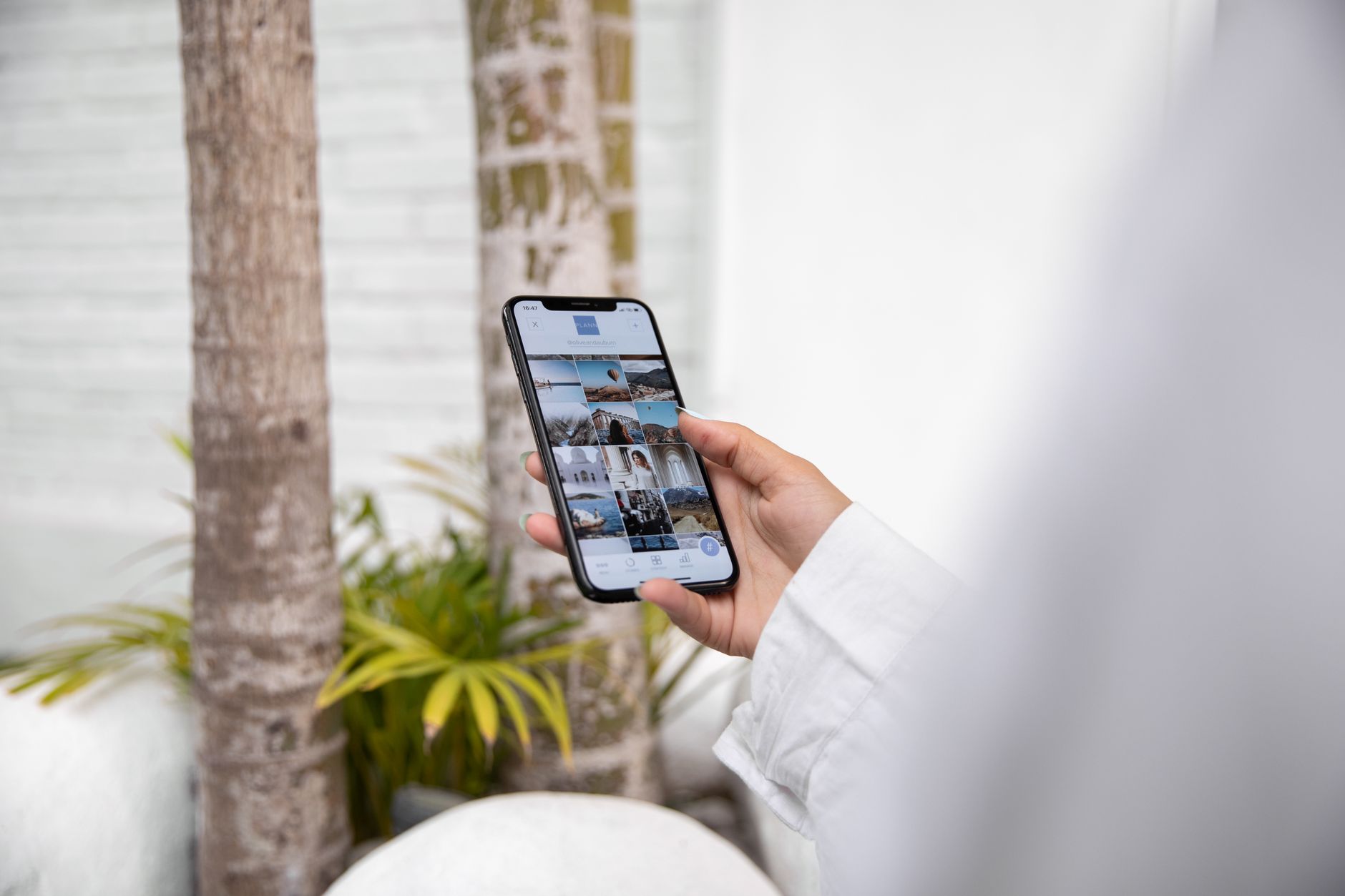 Person scrolling social media on a smartphone, illustrating how Ofcom Online Safety Act social media rules UK will change what users see