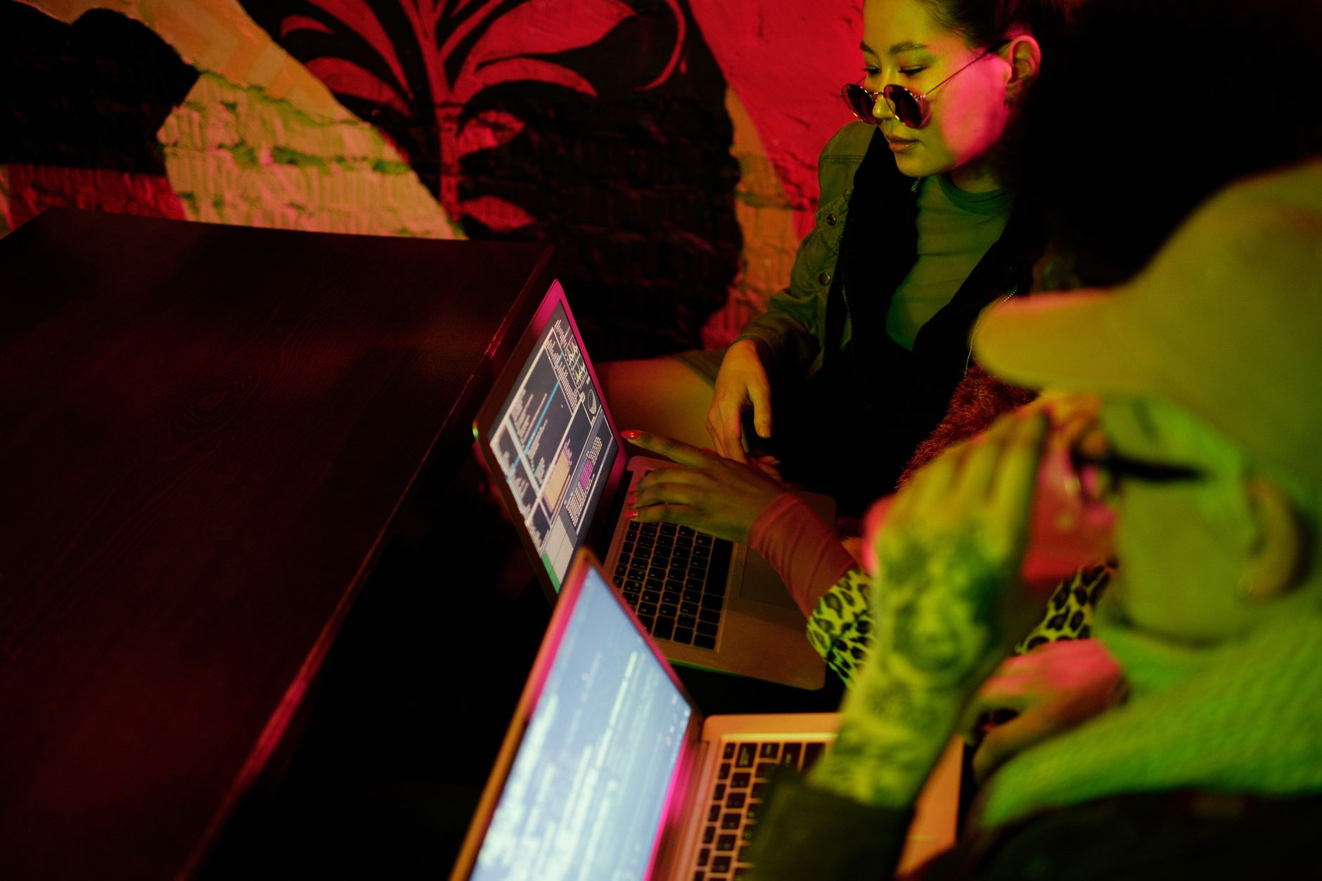 Teen entrepreneur UK 2026 developing an app on a laptop at home